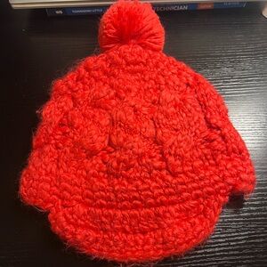 Orangy red knitted beanie beret with Pom Pom on top :)
